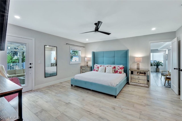 bedroom featuring access to exterior, light hardwood / wood-style flooring, and ceiling fan