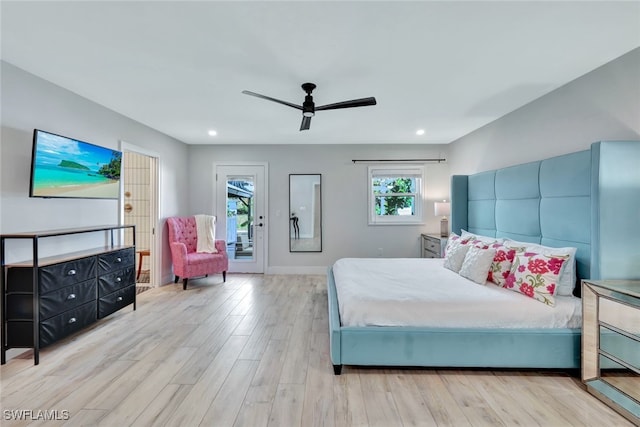 bedroom featuring ceiling fan, access to outside, and light hardwood / wood-style flooring