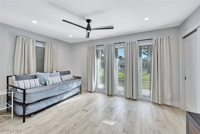 interior space featuring ceiling fan and light wood-type flooring