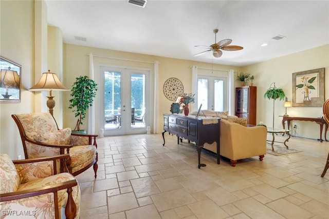 interior space featuring plenty of natural light, ceiling fan, and french doors