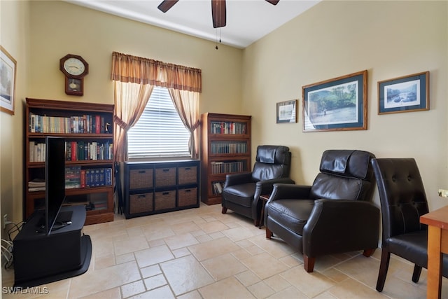 sitting room with ceiling fan