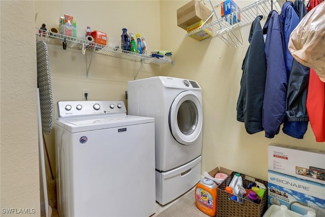 laundry area featuring separate washer and dryer