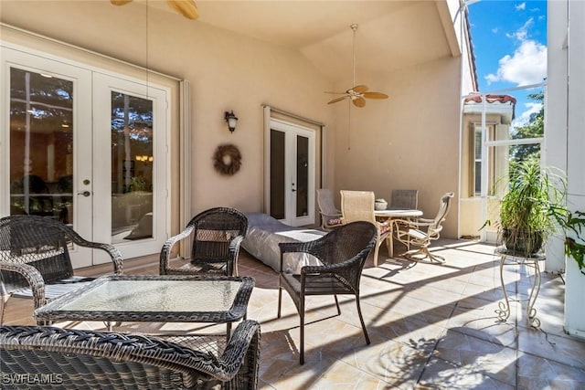 view of patio / terrace featuring french doors and ceiling fan