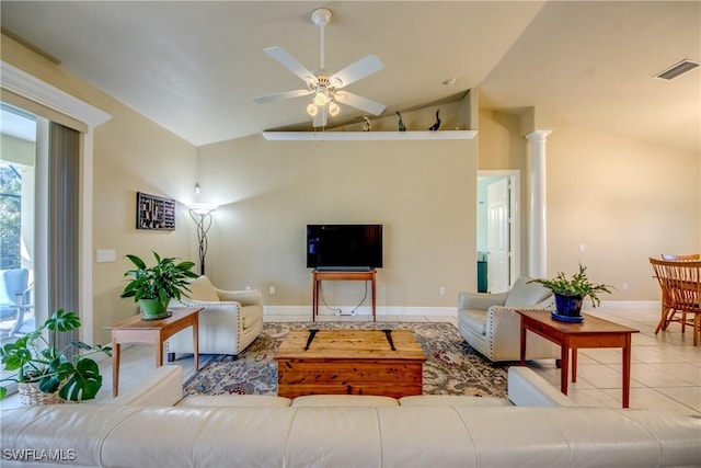 living room with light tile patterned floors, high vaulted ceiling, ornate columns, and ceiling fan