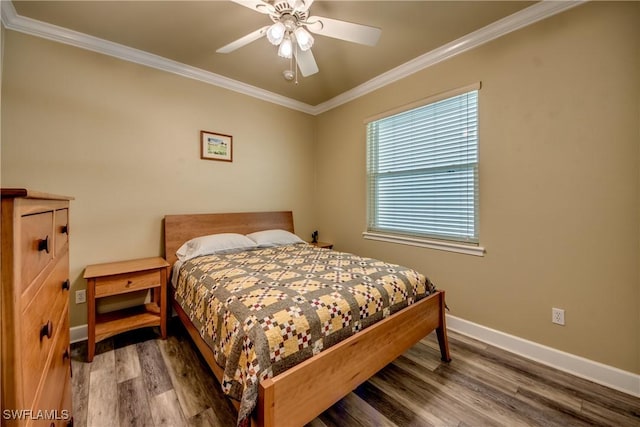 bedroom with wood-type flooring, ceiling fan, and crown molding