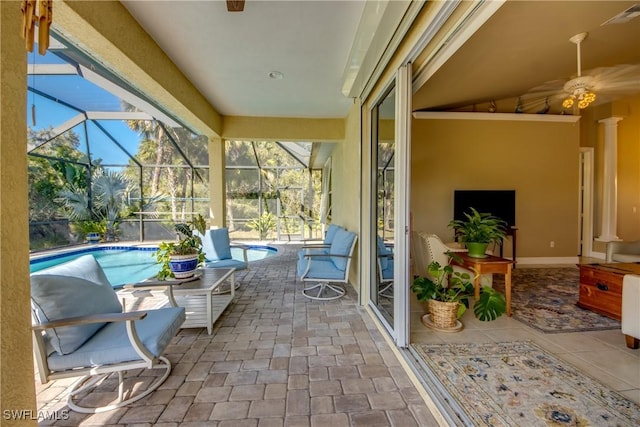 view of patio / terrace featuring a lanai