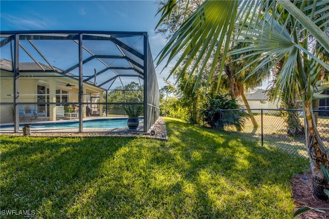 view of yard featuring a lanai