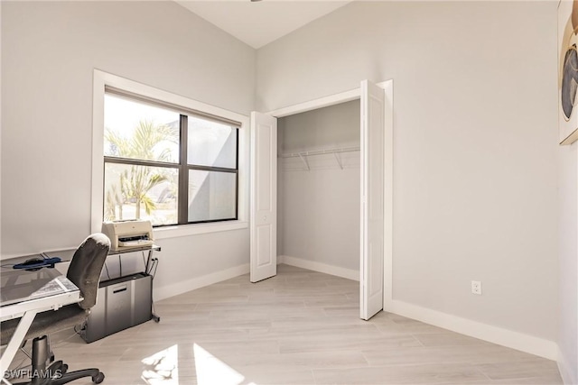 office area with light hardwood / wood-style flooring