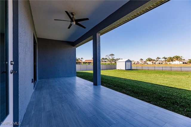 view of patio featuring a storage shed