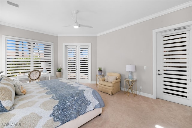 bedroom featuring ceiling fan, light colored carpet, crown molding, and multiple windows