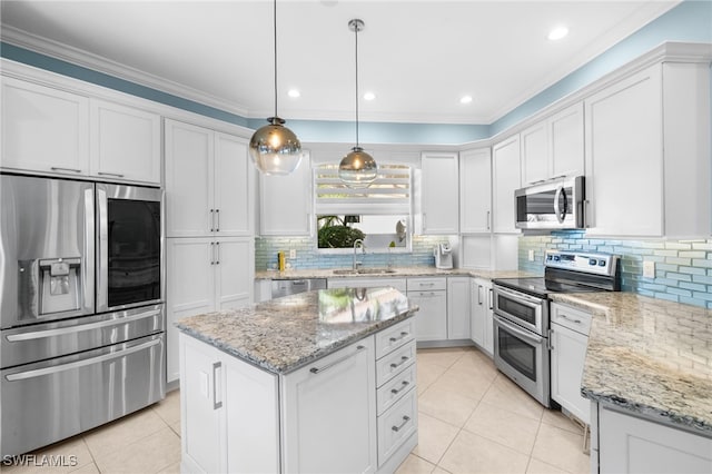 kitchen with sink, white cabinetry, and stainless steel appliances