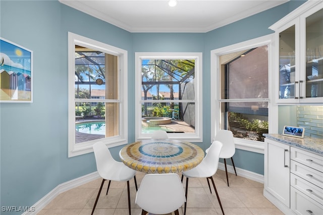 tiled dining room with ornamental molding