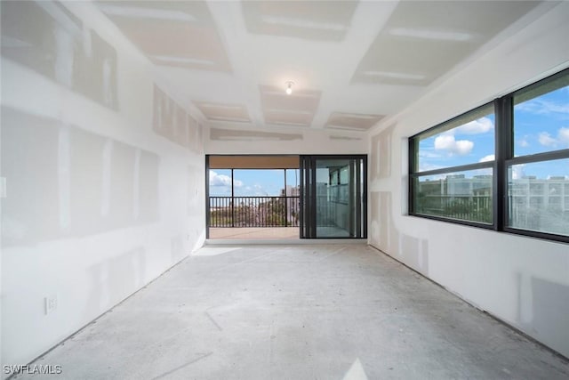 spare room featuring a wealth of natural light