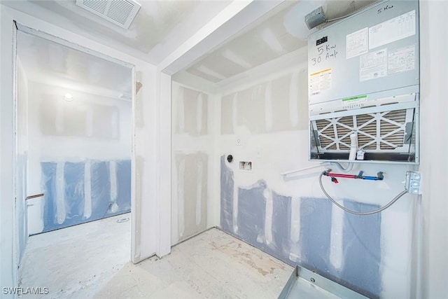 bathroom with concrete flooring