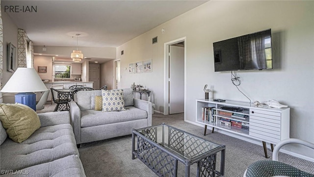 living room featuring carpet flooring