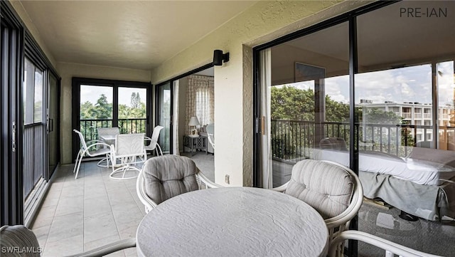 sunroom featuring a healthy amount of sunlight