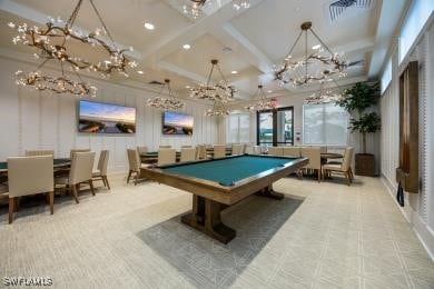 game room featuring coffered ceiling, billiards, ornamental molding, and beam ceiling