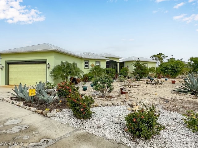 ranch-style home with a garage