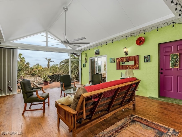 interior space featuring ceiling fan and vaulted ceiling