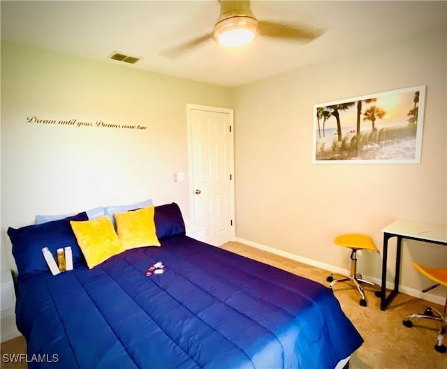 carpeted bedroom featuring ceiling fan