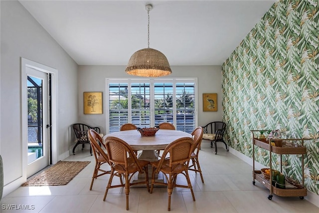 tiled dining space with a wealth of natural light