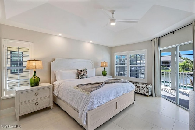 tiled bedroom with access to exterior and ceiling fan