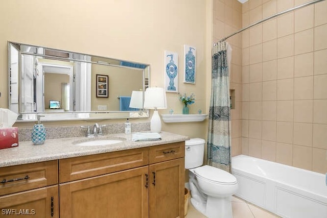 full bathroom with tile patterned floors, shower / bath combo, toilet, and vanity