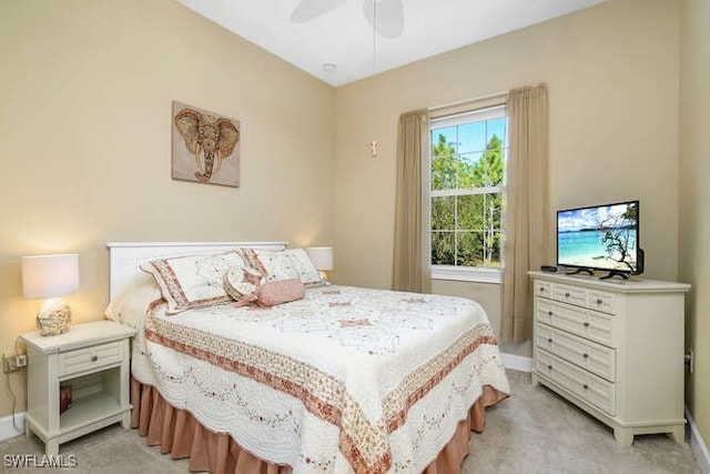 bedroom featuring ceiling fan and light colored carpet