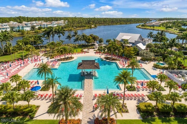 view of swimming pool with a water view