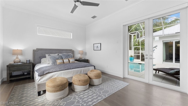 bedroom with access to outside, crown molding, ceiling fan, and hardwood / wood-style flooring