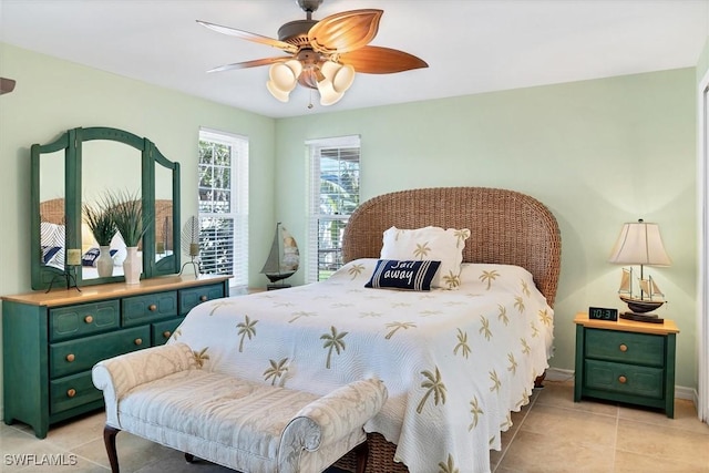 bedroom featuring ceiling fan and light tile patterned flooring