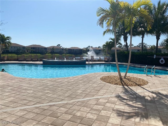 view of pool featuring a patio