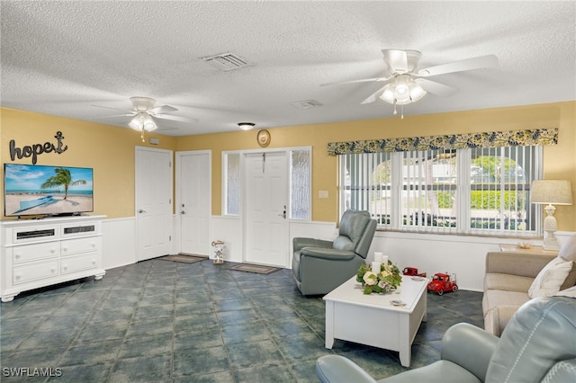 living room featuring a textured ceiling