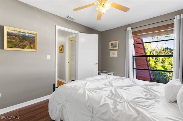 bedroom featuring hardwood / wood-style flooring and ceiling fan