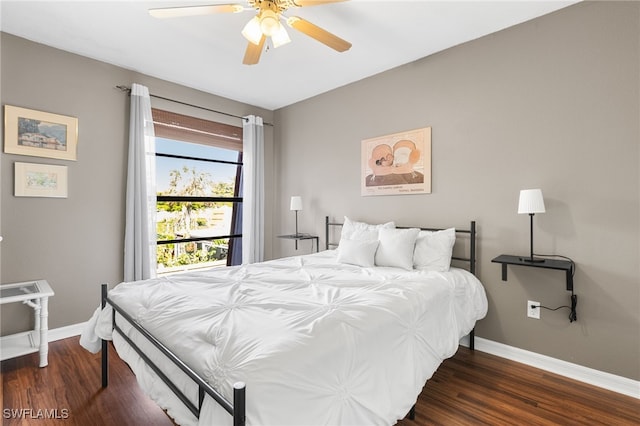 bedroom featuring ceiling fan and dark wood-type flooring