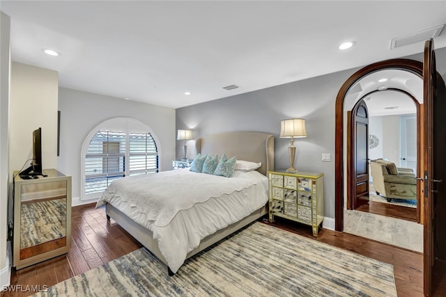 bedroom featuring dark hardwood / wood-style floors