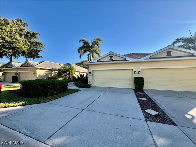 single story home with a garage