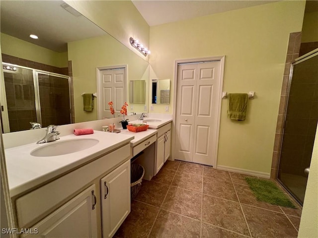 bathroom with vanity, tile patterned floors, and an enclosed shower