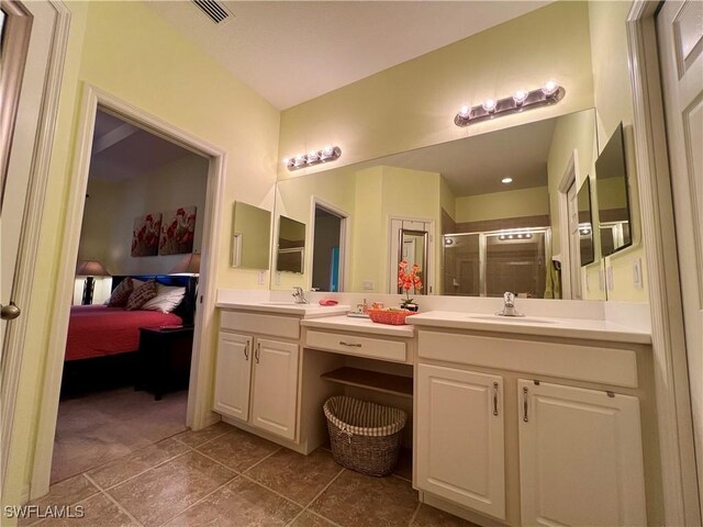 bathroom featuring vanity and walk in shower