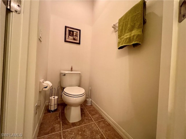 bathroom featuring toilet