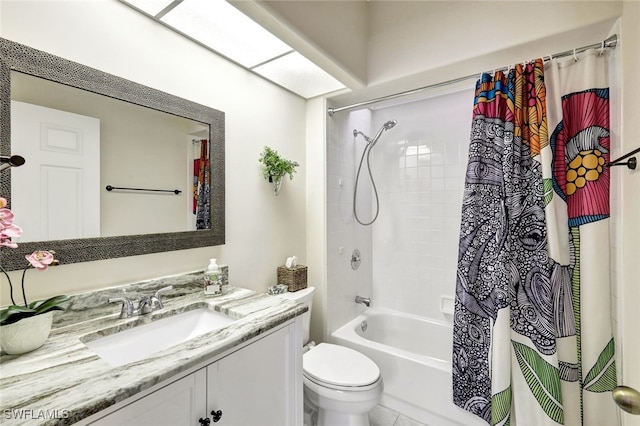 full bathroom featuring vanity, toilet, and shower / tub combo