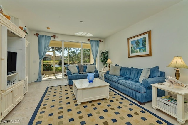 living room with light tile patterned floors