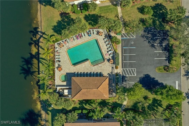 birds eye view of property featuring a water view