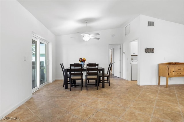 dining area featuring ceiling fan, lofted ceiling, and light tile patterned flooring