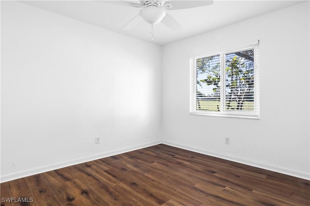 unfurnished room with ceiling fan and dark hardwood / wood-style floors