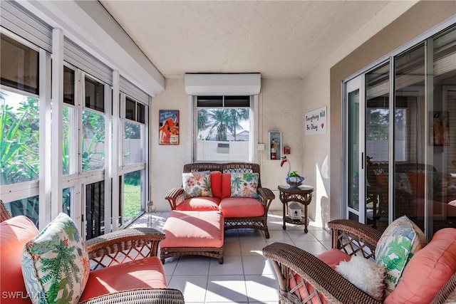 sunroom / solarium featuring a healthy amount of sunlight