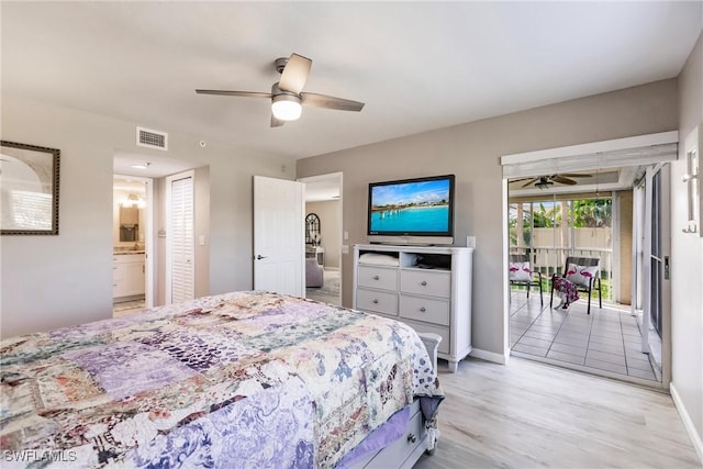 bedroom with ceiling fan, light wood-type flooring, and ensuite bathroom