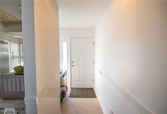 interior space featuring light tile patterned floors