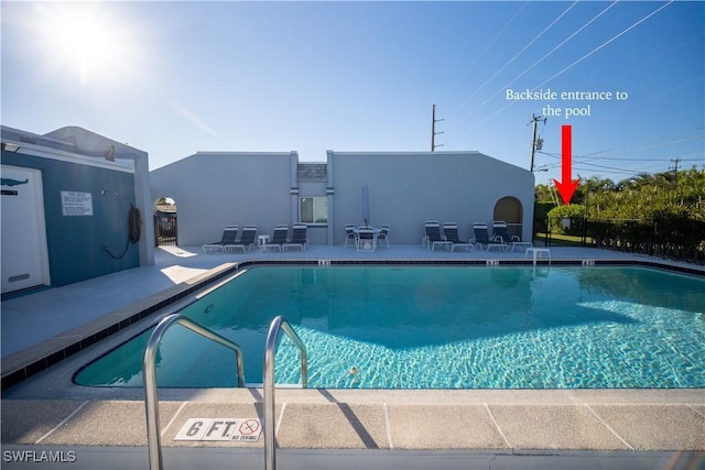 view of pool featuring a patio