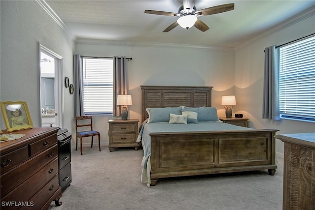 bedroom featuring light carpet, ceiling fan, and ornamental molding